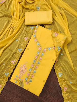 Yellow cotton silk embroidered unstitched dressaterial 1