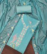 Turquoise cotton silk embroidered unstitched dressaterial