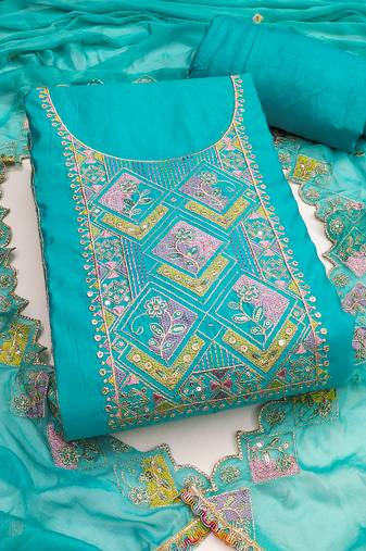 Turquoise cotton silk embroidered unstitched dress material