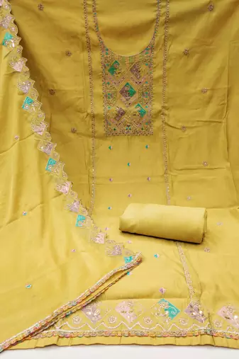 Yellow cotton silk embroidered unstitched dress material
