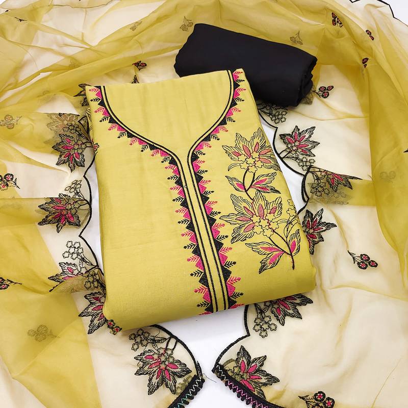 Yellow cotton silk embroidered unstitched dress material