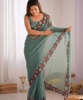 designer heavy embroidery border  tissue green saree 3