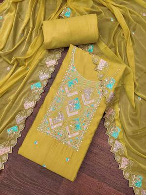 Yellow cotton silk embroidered unstitched dress material 2