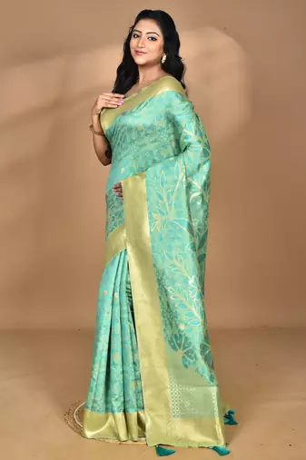 green zari silk blend saree with blouse piece