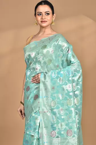 light green chanderi silk blend saree with blouse piece