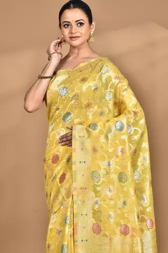 yellow chanderi silk blend saree with blouse piece