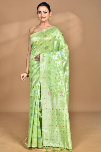 green chanderi silk blend saree with blouse piece