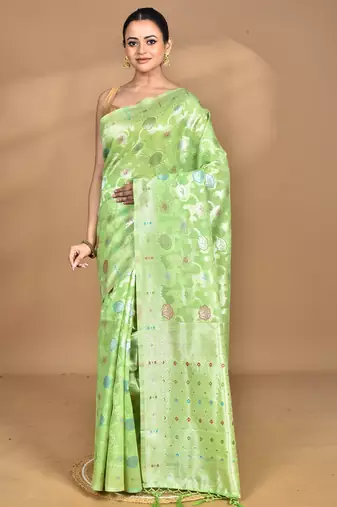 green chanderi silk blend saree with blouse piece