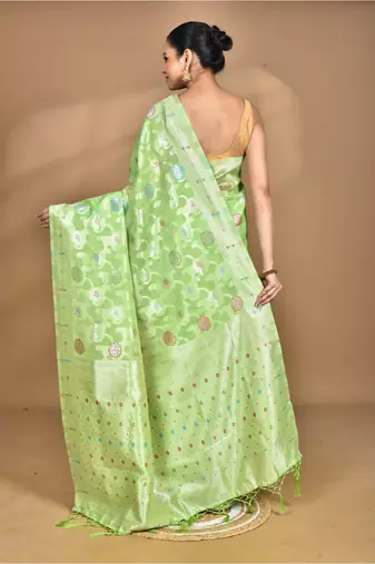 green chanderi silk blend saree with blouse piece