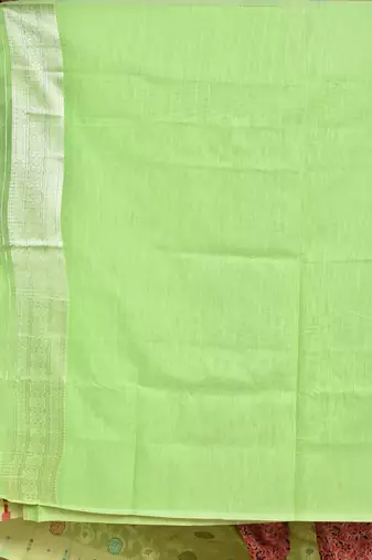 green chanderi silk blend saree with blouse piece
