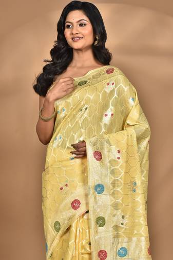 yellow chanderi silk blend saree with blouse piece