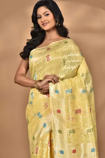 yellow chanderi silk blend saree with blouse piece