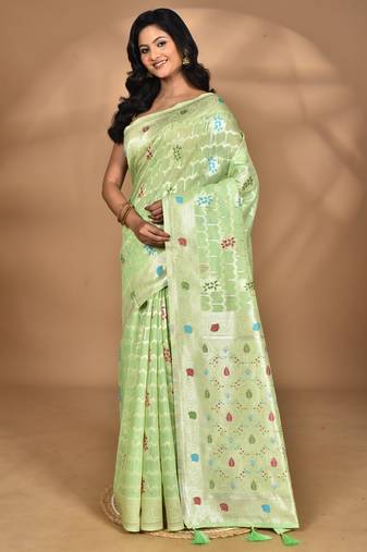light green chanderi silk blend saree with blouse piece