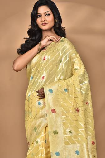 yellow chanderi silk blend saree with blouse piece