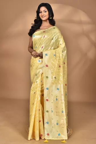 yellow chanderi silk blend saree with blouse piece
