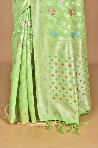 green chanderi silk blend saree with blouse piece