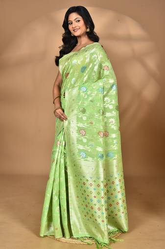 green chanderi silk blend saree with blouse piece
