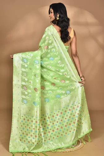 green chanderi silk blend saree with blouse piece