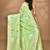green chanderi silk blend saree with blouse piece
