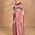 purple kanjiviram silk blend saree with blouse piece