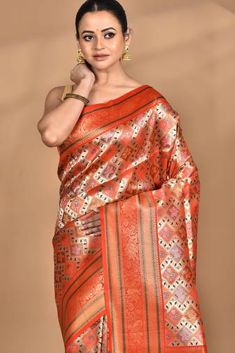 orange kanjiviram silk blend saree with blouse piece