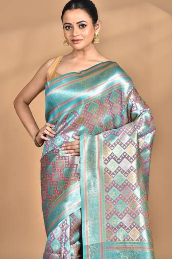 pink kanjiviram silk blend saree with blouse piece