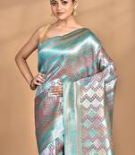 pink kanjiviram silk blend saree with blouse piece