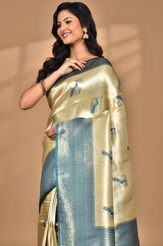 beige banarasi silk blend saree with blouse piece