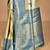 beige banarasi silk blend saree with blouse piece