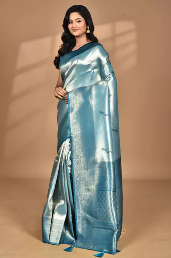 green banarasi silk blend saree with blouse piece