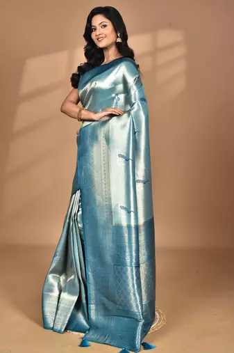 green banarasi silk blend saree with blouse piece