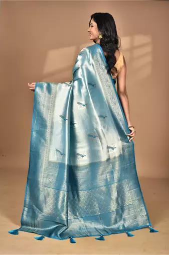 green banarasi silk blend saree with blouse piece
