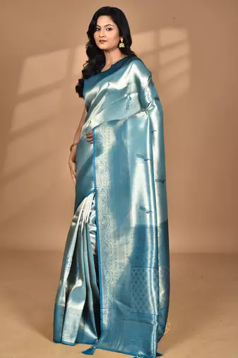 green banarasi silk blend saree with blouse piece