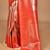 red banarasi silk blend saree with blouse piece