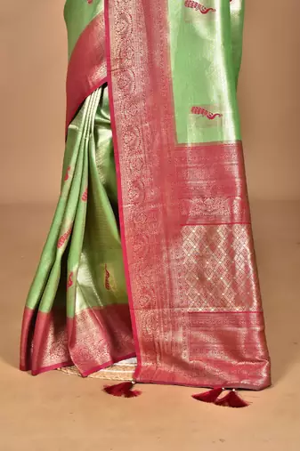 green banarasi silk blend saree with blouse piece