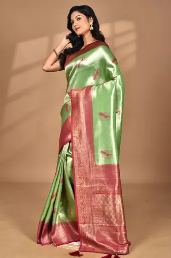 green banarasi silk blend saree with blouse piece