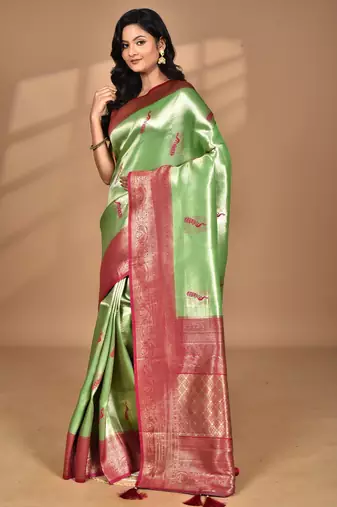 green banarasi silk blend saree with blouse piece