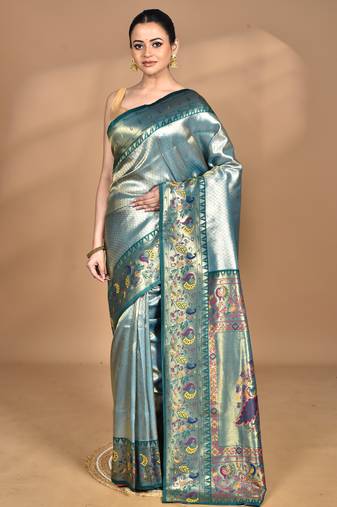 green banarasi silk blend saree with blouse piece