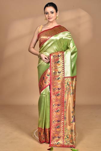 light green banarasi silk blend saree with blouse piece
