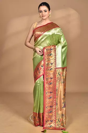 light green banarasi silk blend saree with blouse piece