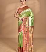 light green banarasi silk blend saree with blouse piece
