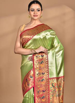 light green banarasi silk blend saree with blouse piece 2
