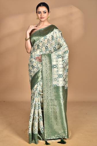 green chanderi silk blend saree with blouse piece