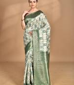 green chanderi silk blend saree with blouse piece