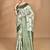 green chanderi silk blend saree with blouse piece