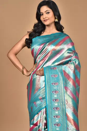 maroon ethnic motifs silk blend saree with blouse piece