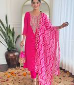 Elegant pink colored party wear embroidered stitched vichitra silk pant style kurti suit with duppatta