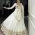 Off-White Rayon Lehenga Choli with Golden Lace FULL STITCH