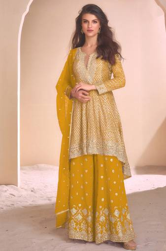 new yellow high low style wedding wear georgette salwar suit for women