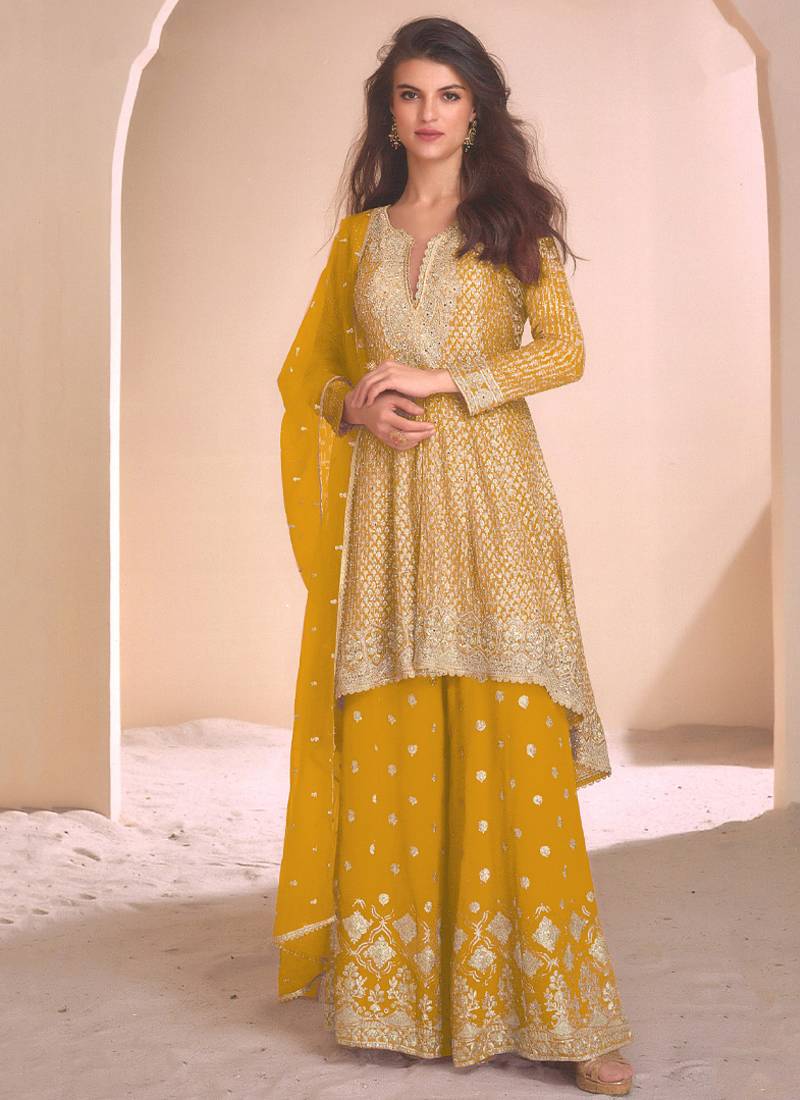 new yellow high low style wedding wear georgette salwar suit for women
